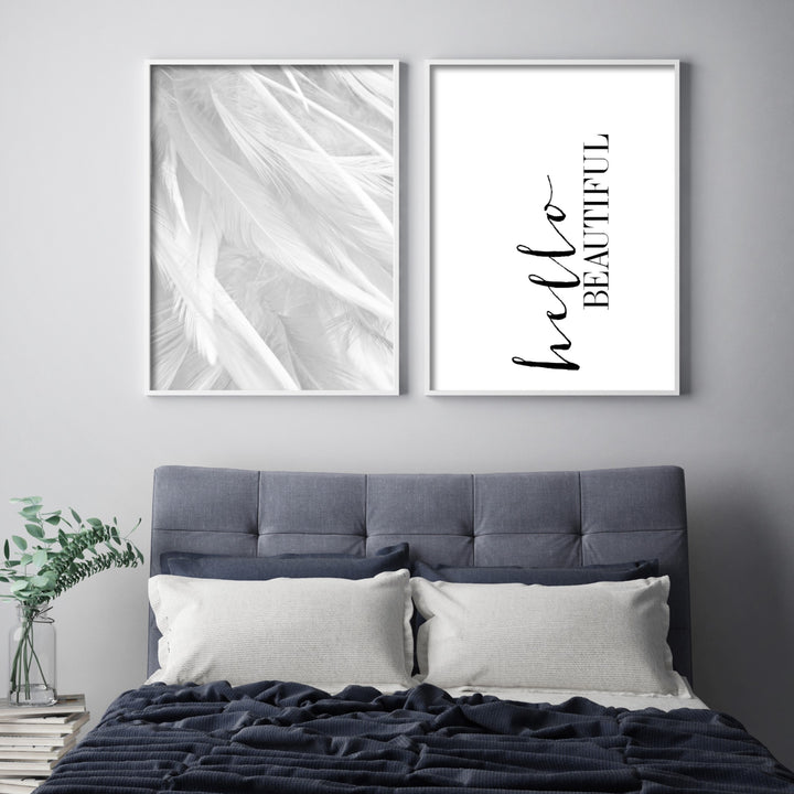 blue bed frame with posters above the bed