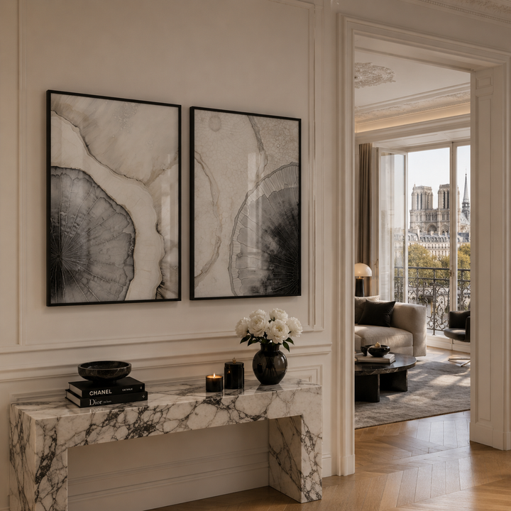 Luxurious living room with marble console table, abstract art, and cityscape view.