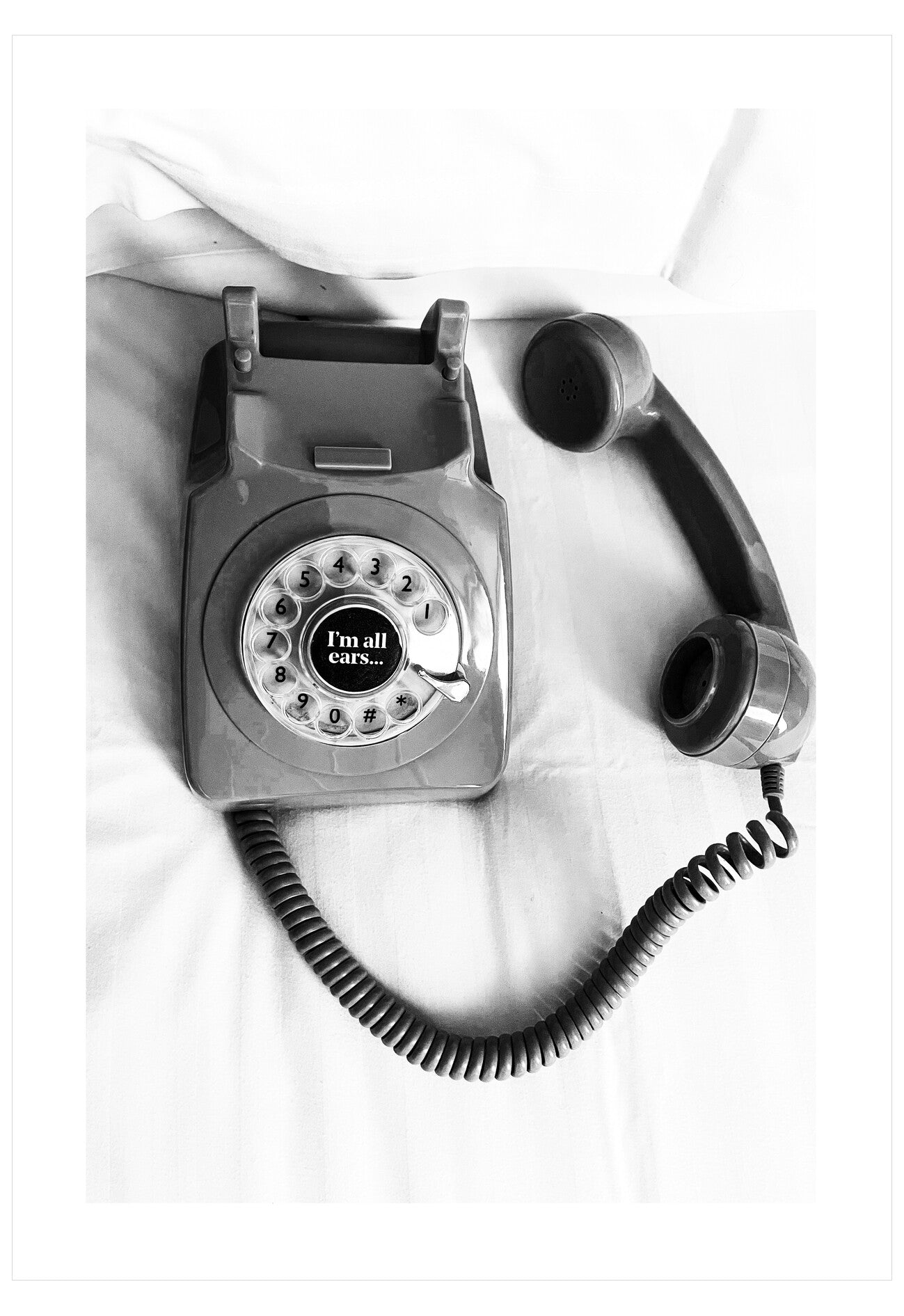 Vintage-style rotary phone on a white background