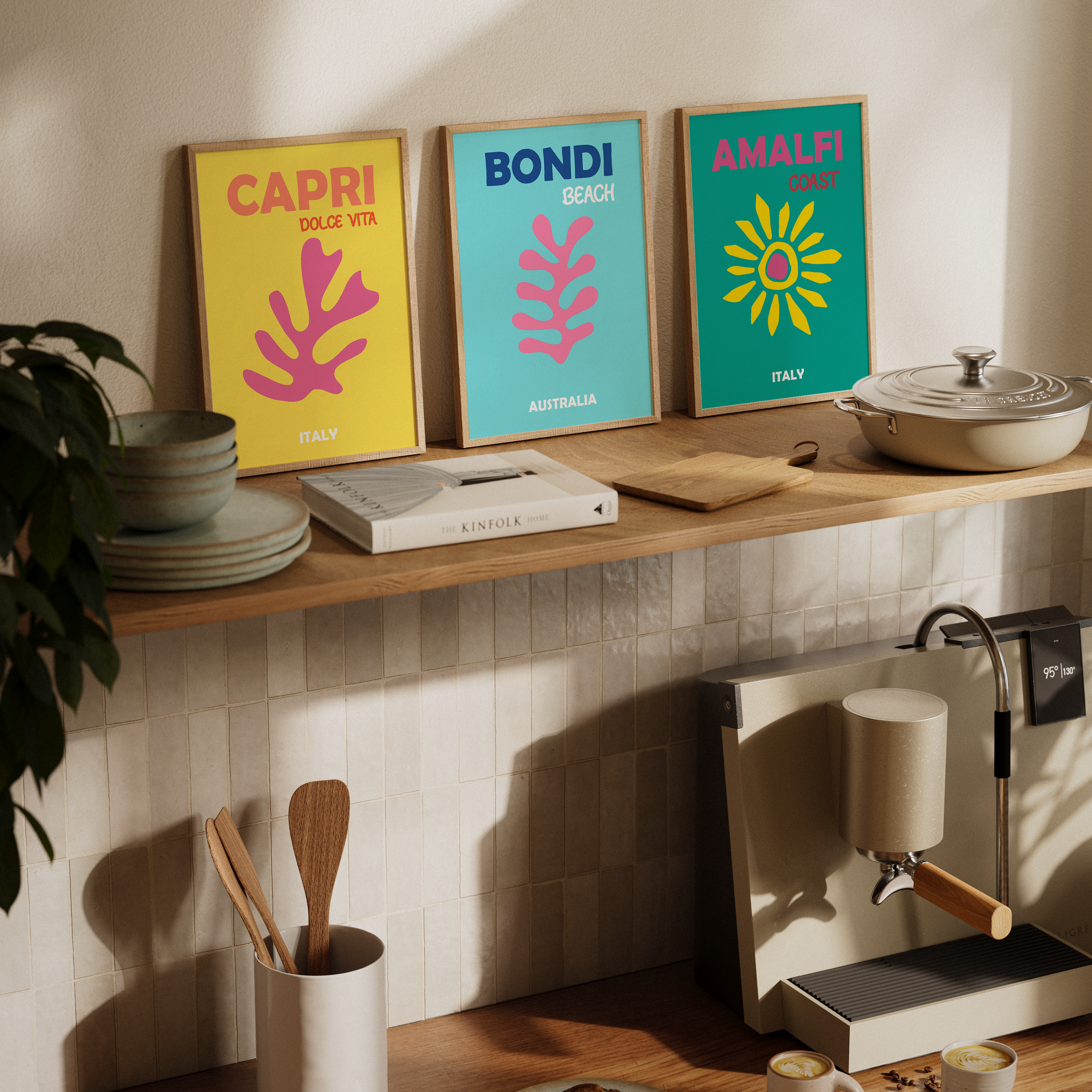 Kitchen shelf with colorful wall art, books, and a coffee machine.