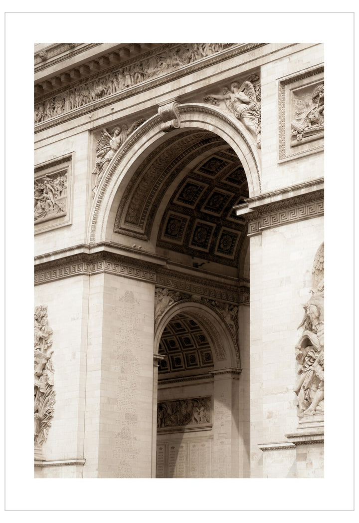 Decorative archway with intricate stone work in sepia tone