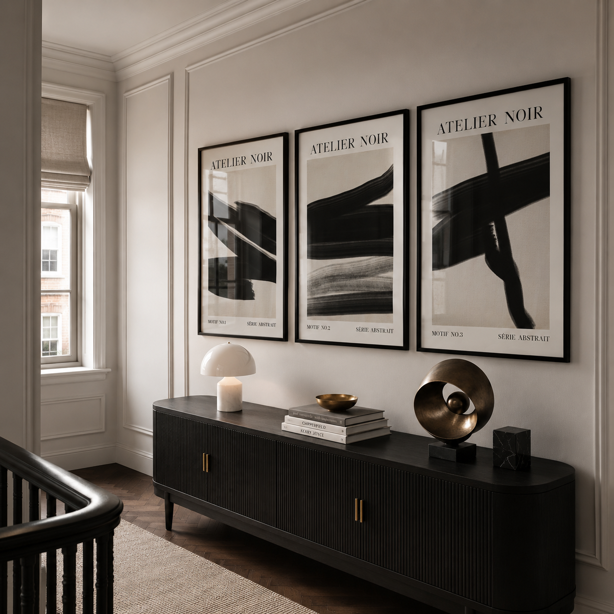Modern interior with a black console table and Atelier Noir wall art