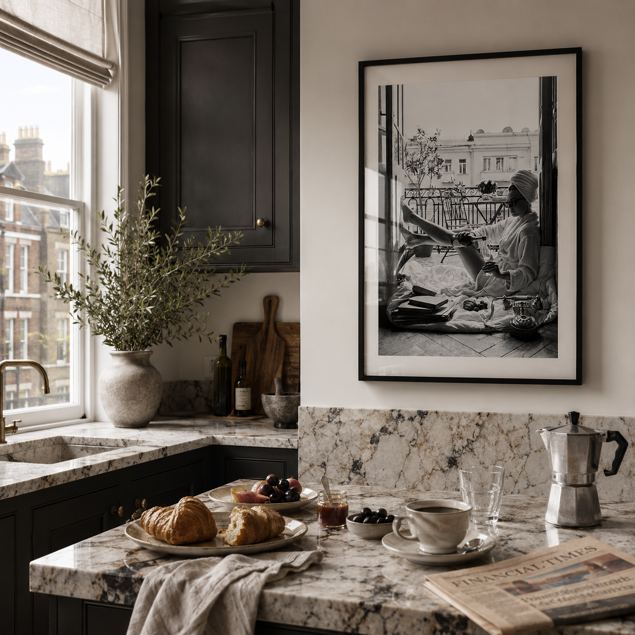 Kitchen with marble countertop, coffee maker, and framed picture on wall