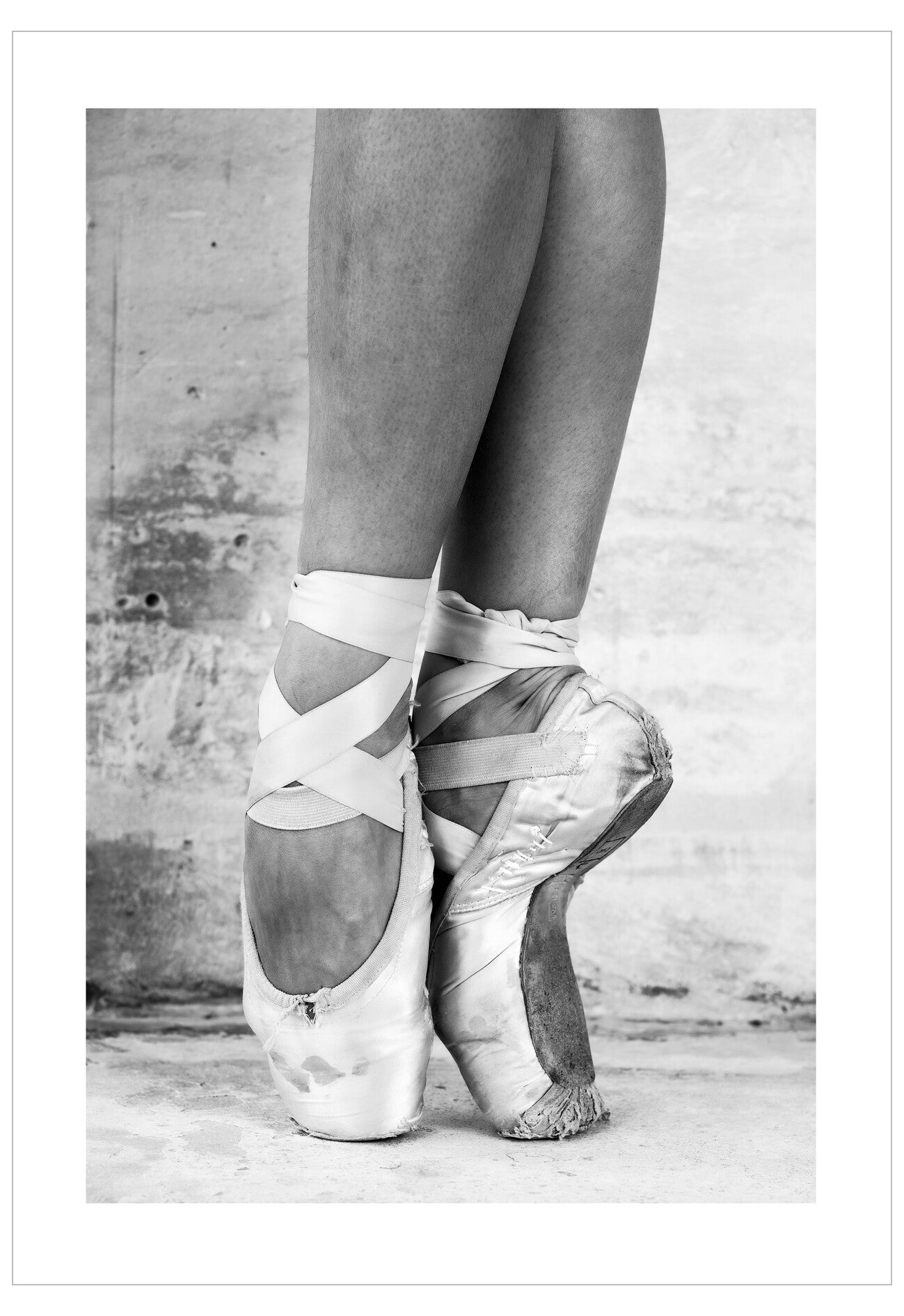 Ballet shoes with ribbons on a plain background