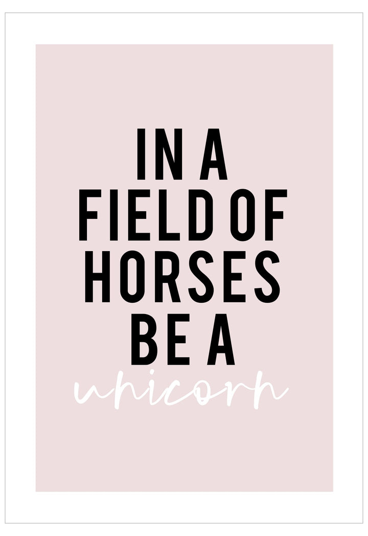 Motivational quote 'In a field of horses be a unicorn' on a pink background