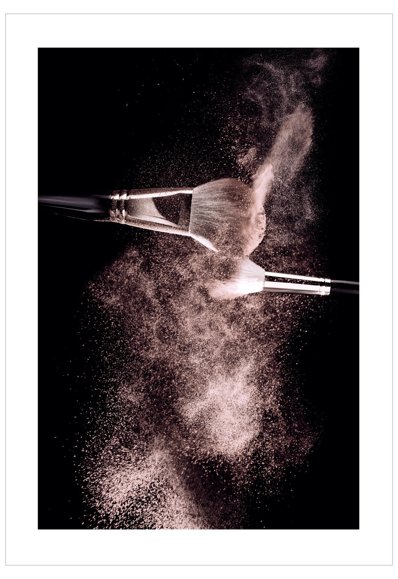Two tweezers with a cloud of dust or powder between them on a black background
