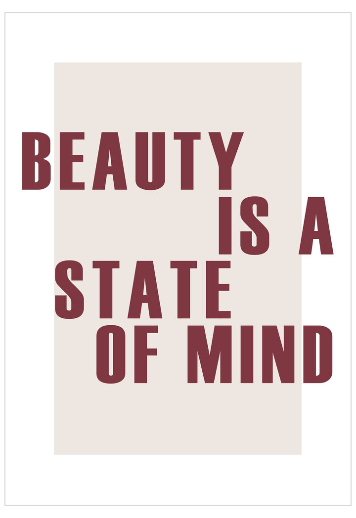 Motivational poster with text 'Beauty is a State of Mind' on a plain background