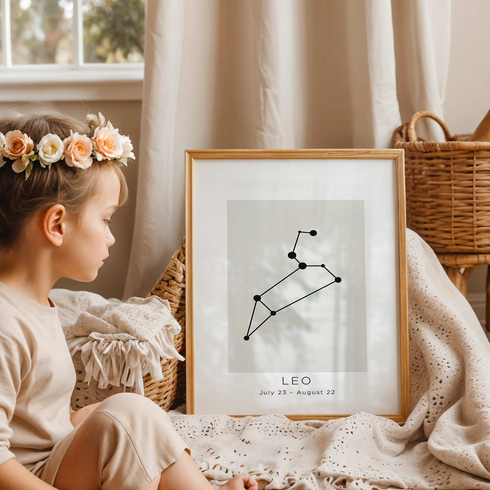 Child with a flower crown sitting next to a framed Leo constellation poster in a cozy room.
