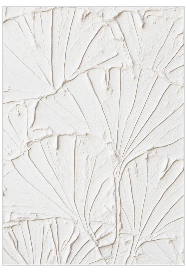 Textured white wall with abstract leaf-like patterns