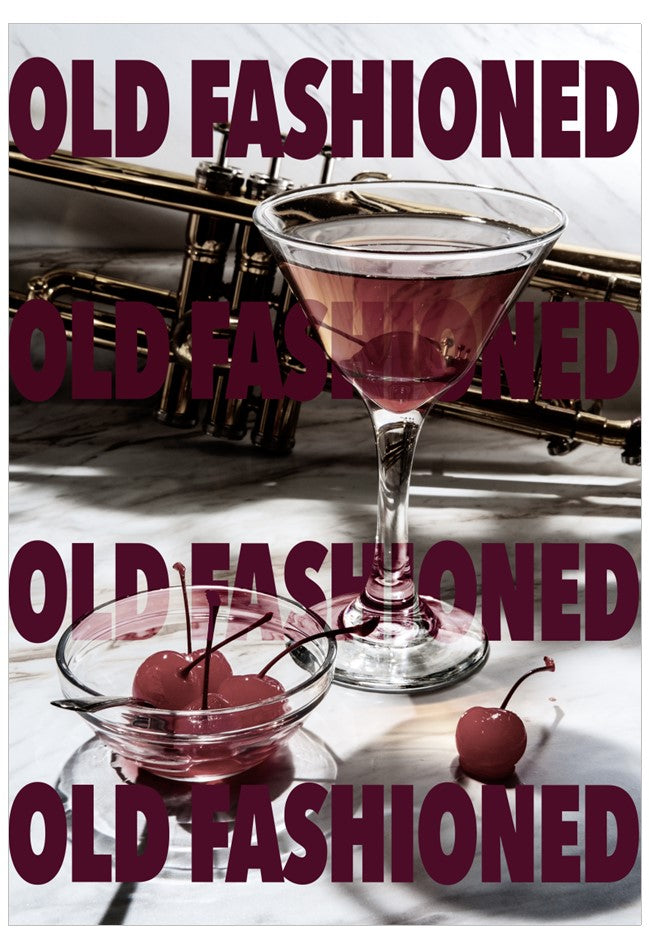 Cocktail glass with cherries on a white background with 'Old Fashioned' text.