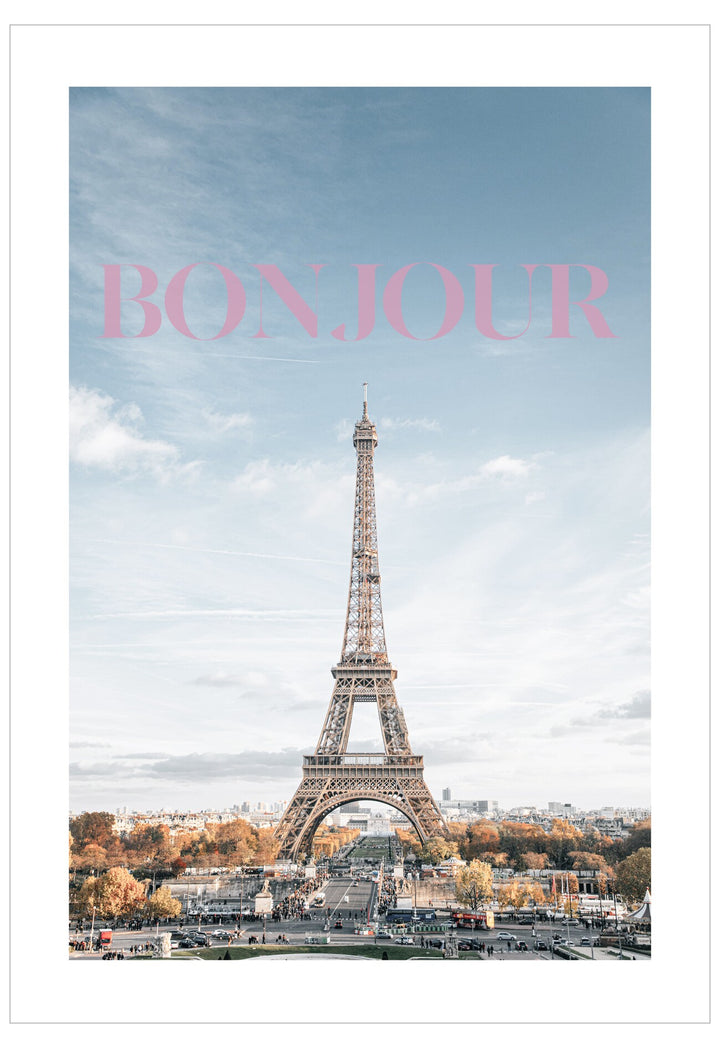 Eiffel Tower with 'Bonjour' text against a blue sky