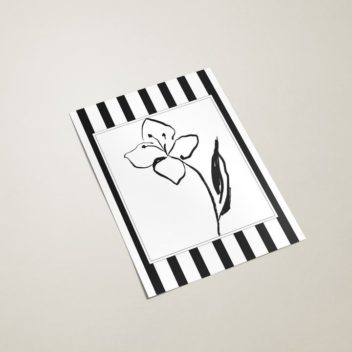 art with black and white striped design and a flower illustration on a beige background
