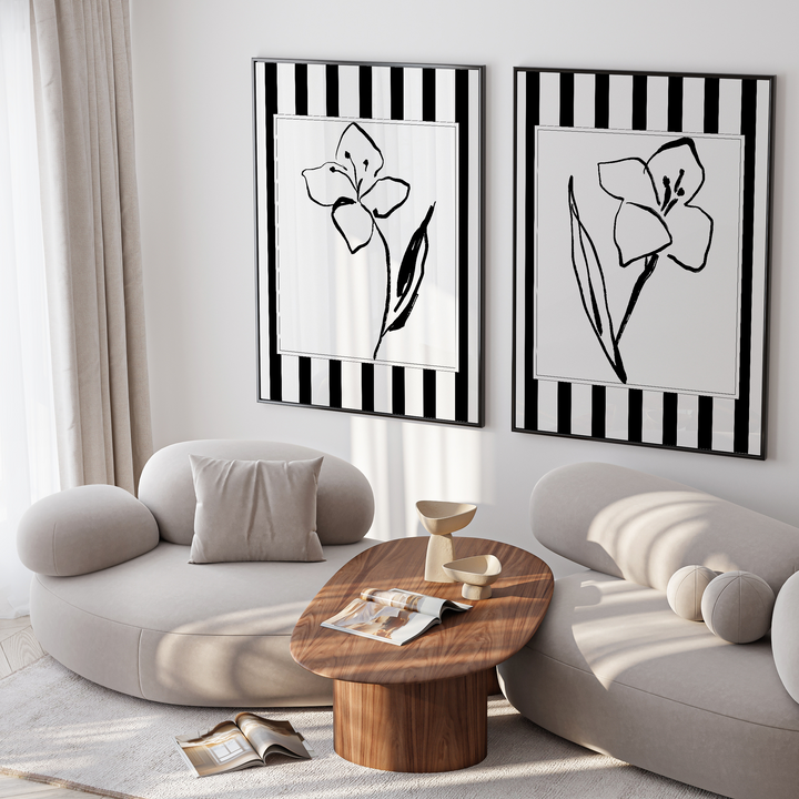 Modern living room with abstract floral artwork on a white wall.