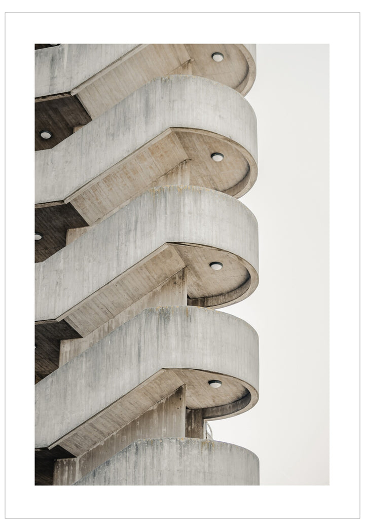 Concrete architectural detail with circular elements on a light gray background