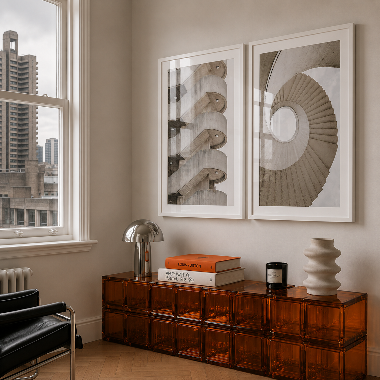 Modern interior with a wooden side table, books, and decorative items near a window with cityscape view.