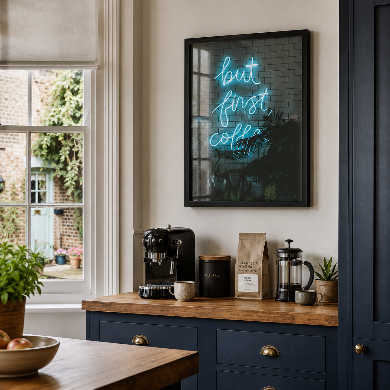 Neon sign on a wall above a kitchen counter with coffee-making equipment.