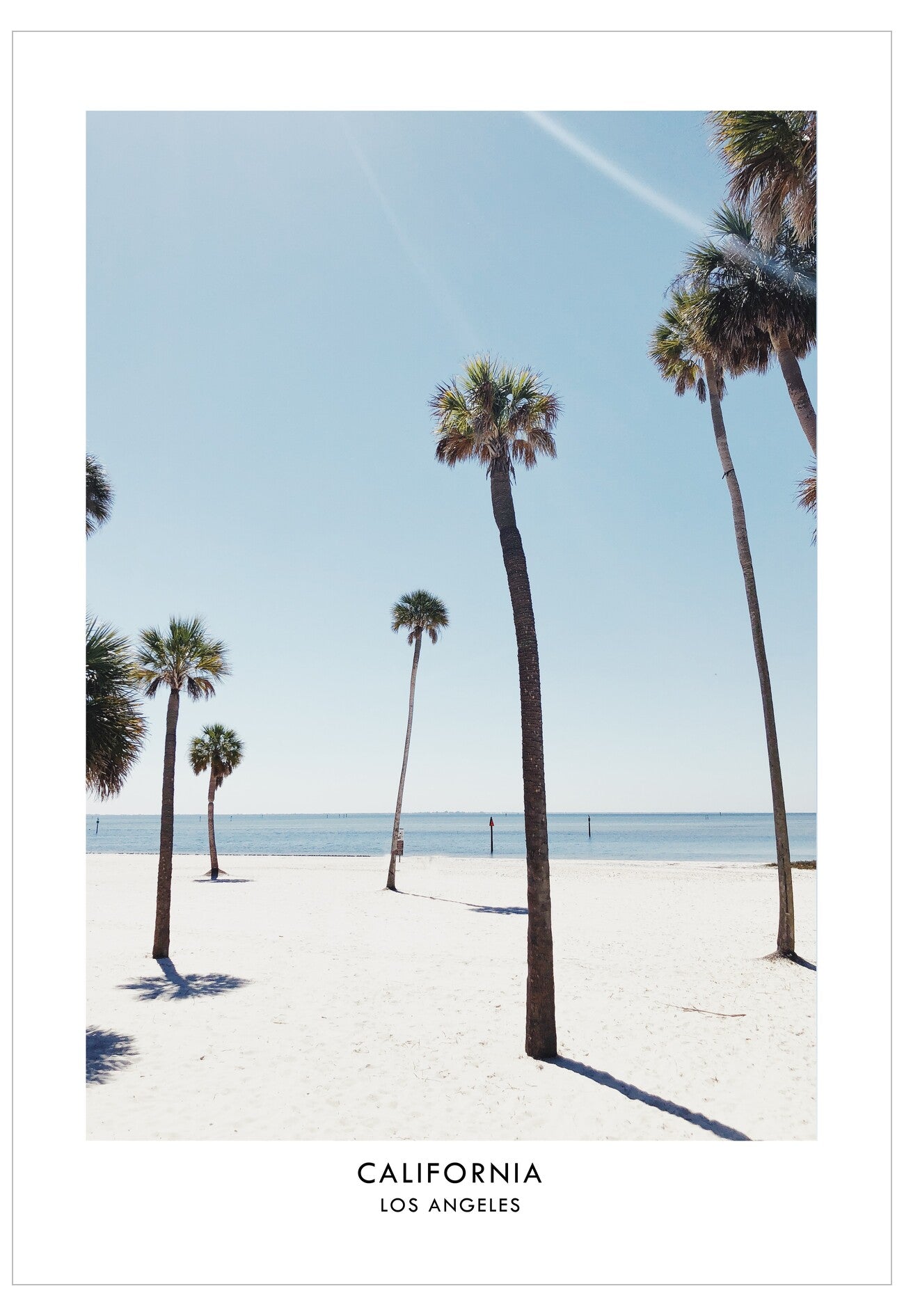 Beach scene with palm trees and clear blue sky, labeled 'California Los Angeles'.