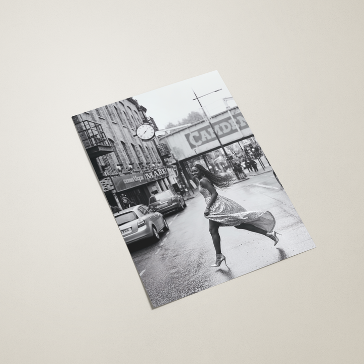 poster with black and white street scene on a beige background