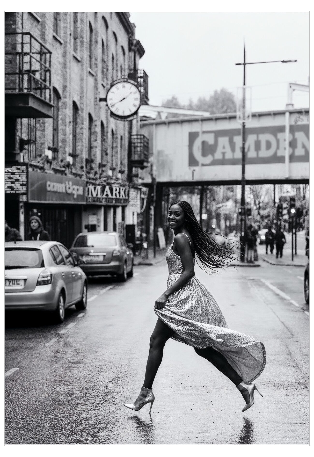 Woman in a dress walking on a city street with 'Camden' sign in the background
