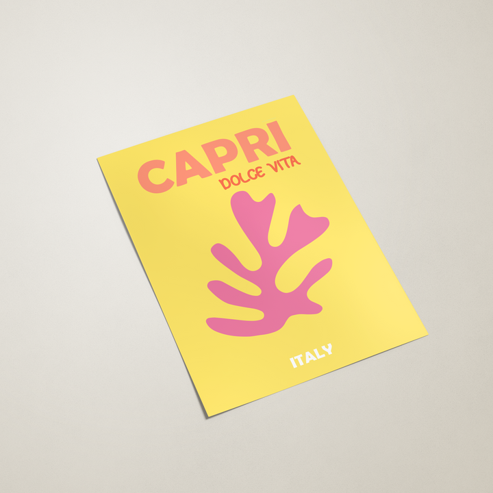Yellow poster with pink leaf design and 'Capri Dolce Vita Italy' text on a light gray background