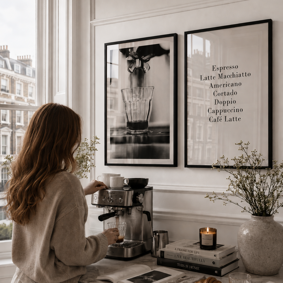 Woman making coffee in a cozy kitchen with framed pictures on the wall.