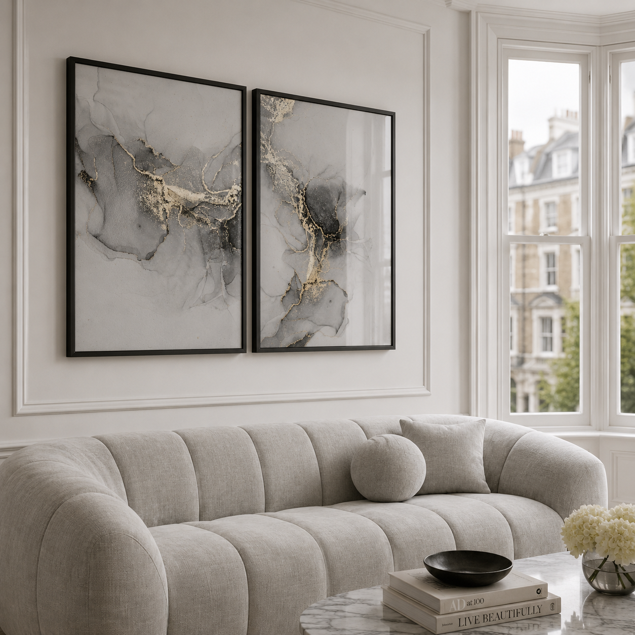 Modern living room with a luxury modern gray sofa, abstract art, and large windows.