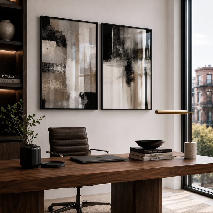 Modern office desk with abstract art, chair, and decor in a well-lit home office in Brooklyn.
