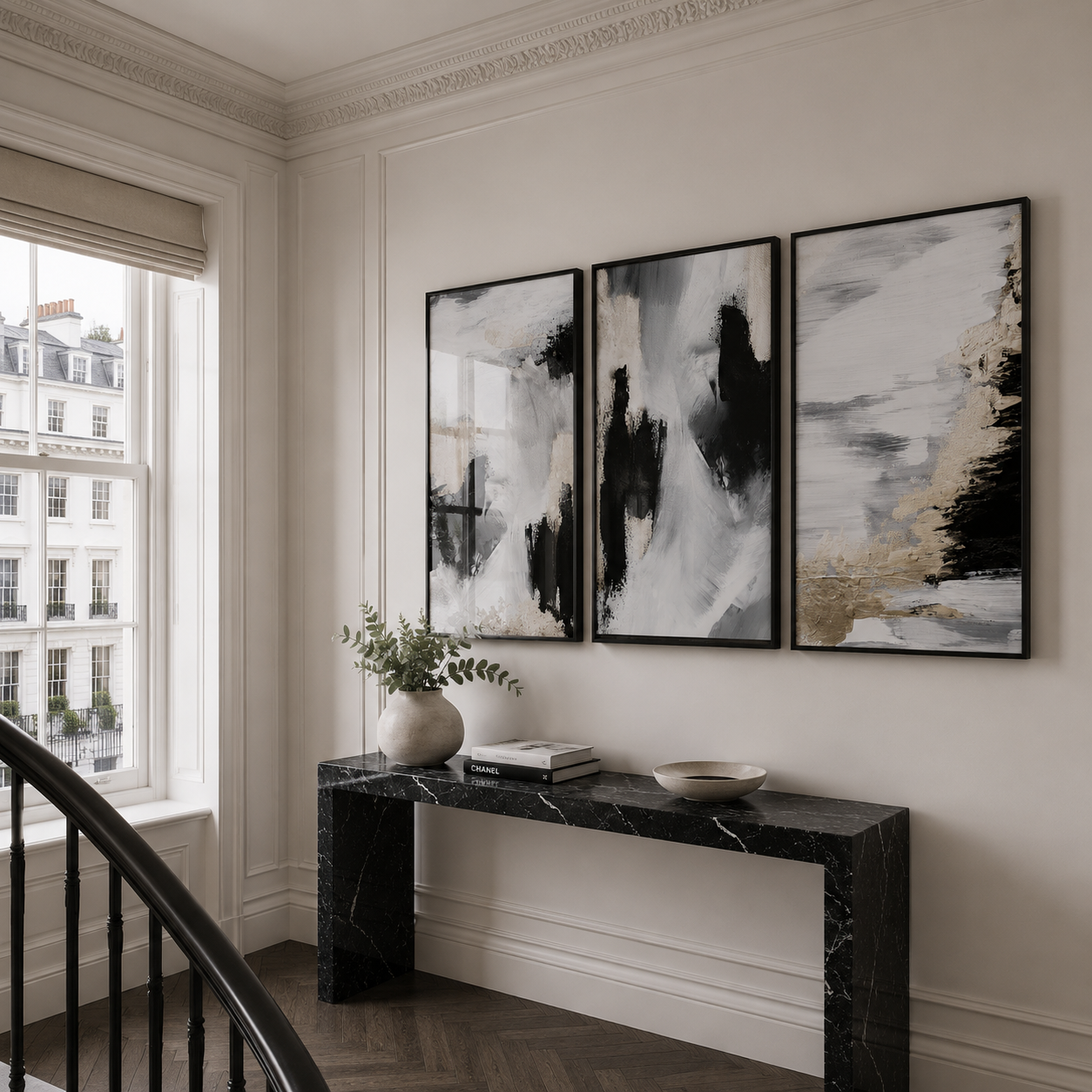 Modern interior with abstract art on the wall and a marble console table.