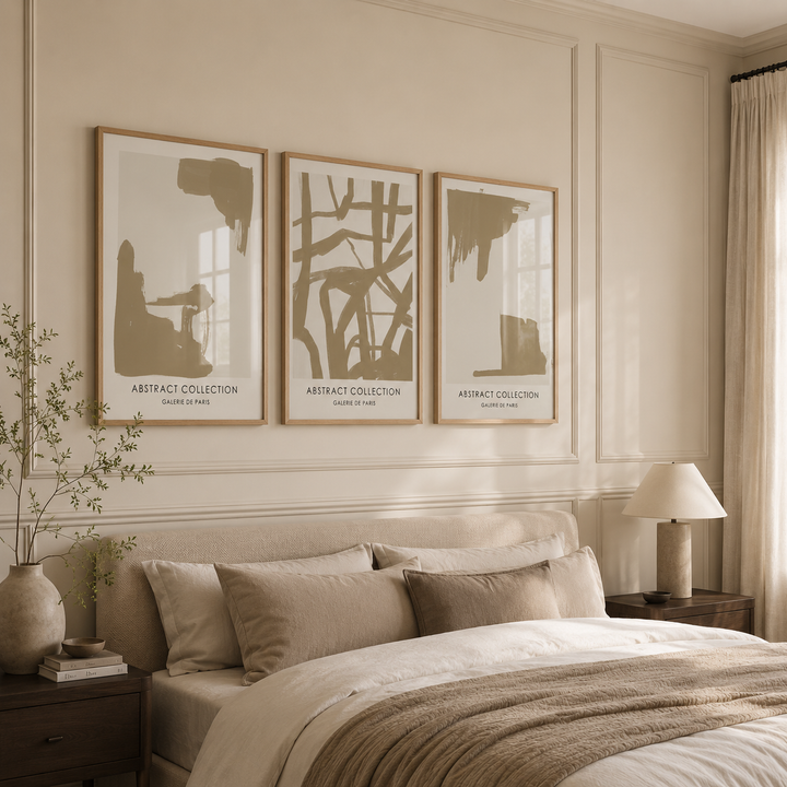 Neatly arranged bedroom with abstract wall art and a bed.