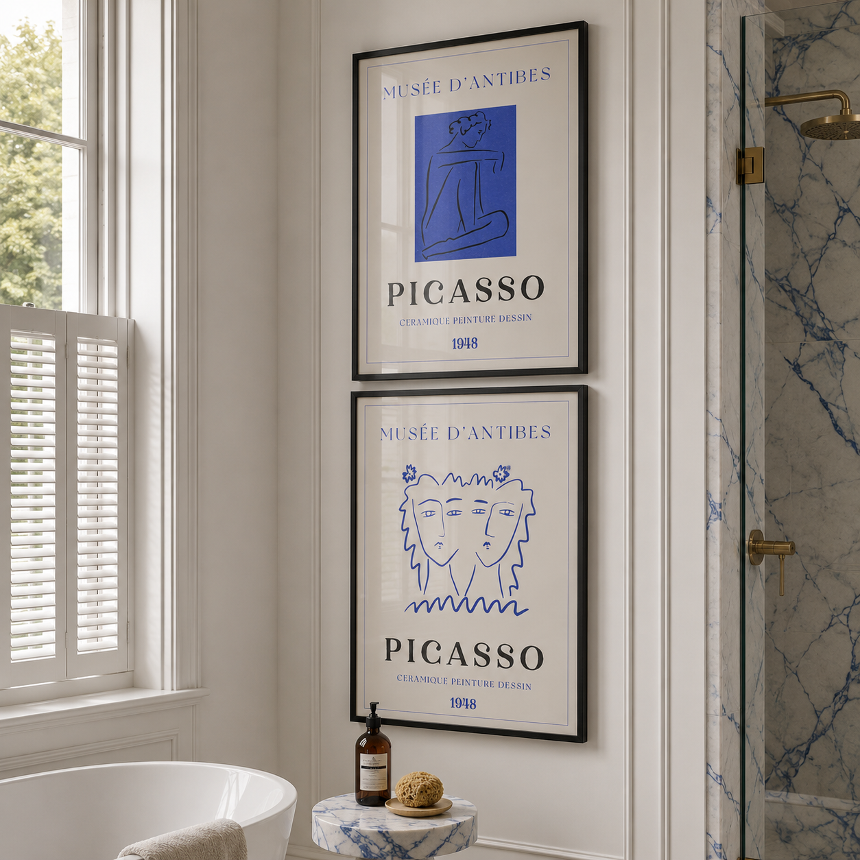 Bathroom with luxury marble shower framed Picasso artwork on the wall