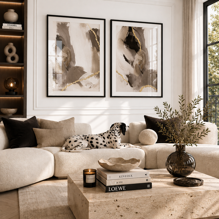 Living room with a sofa, coffee table, and abstract art on the wall.