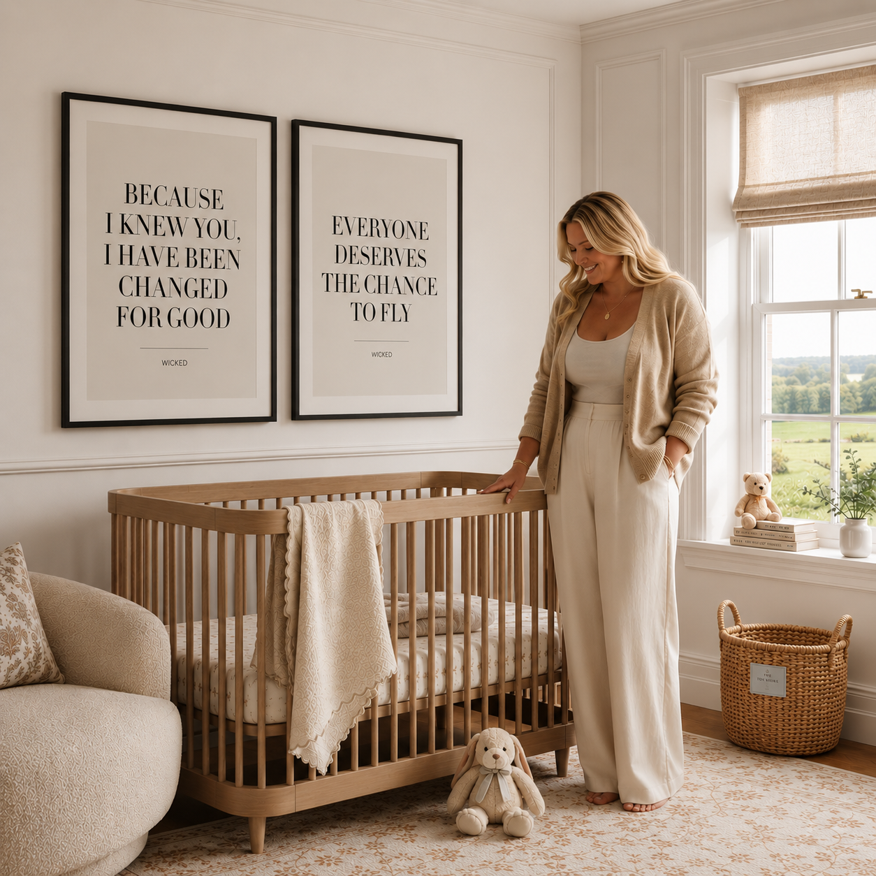 Woman standing next to a crib in a nursery with framed quotes on the wall.