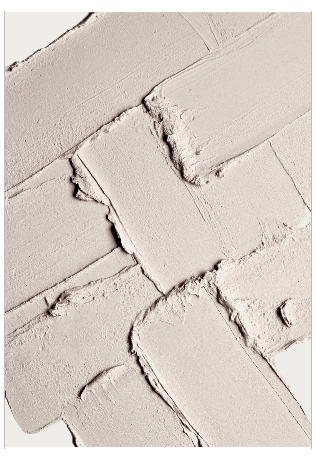 Close-up of a textured white wall with a herringbone pattern