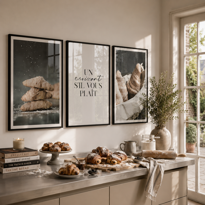 Bakery interior with framed pictures of bread and pastries on the wall.