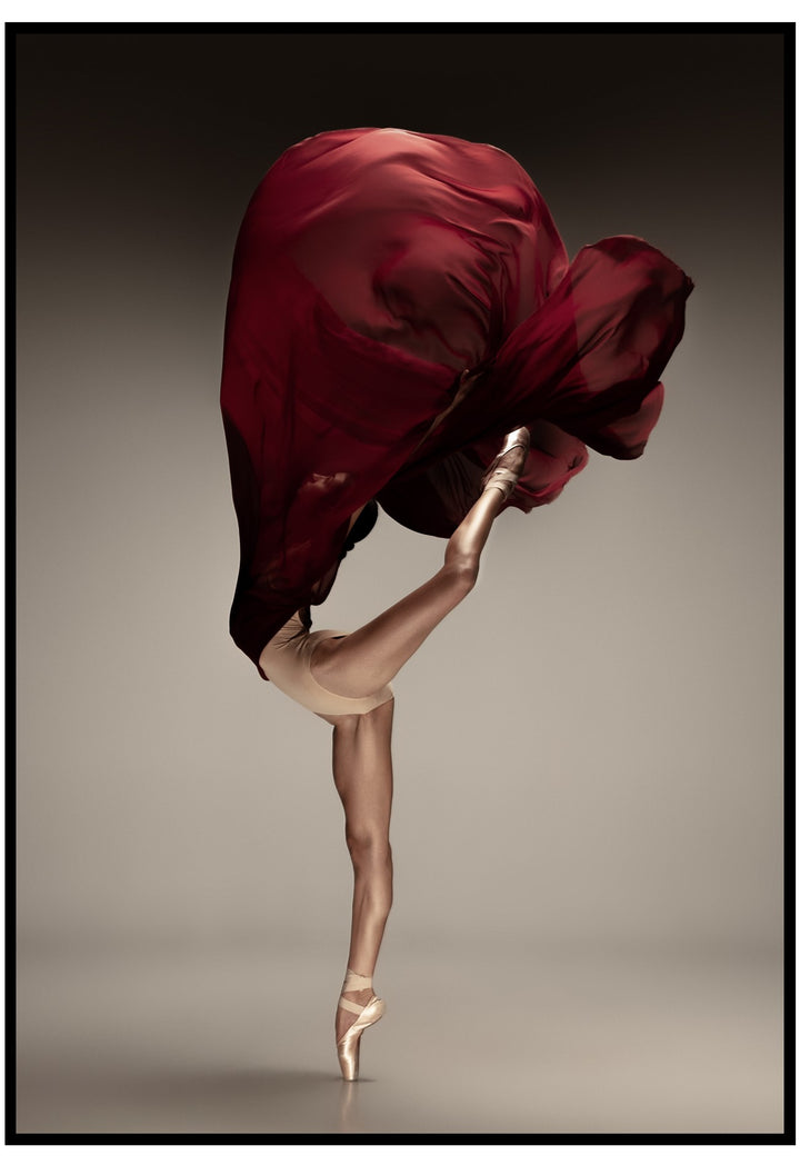 Dancer with a red fabric draped over their head against a neutral background