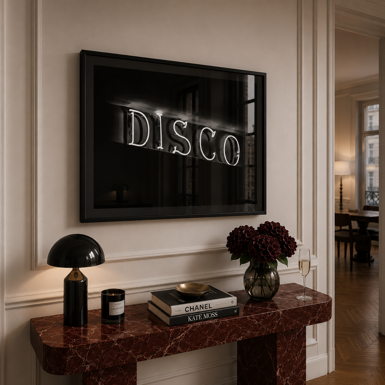 Neon 'DISCO' sign above a marble console table with decor items.