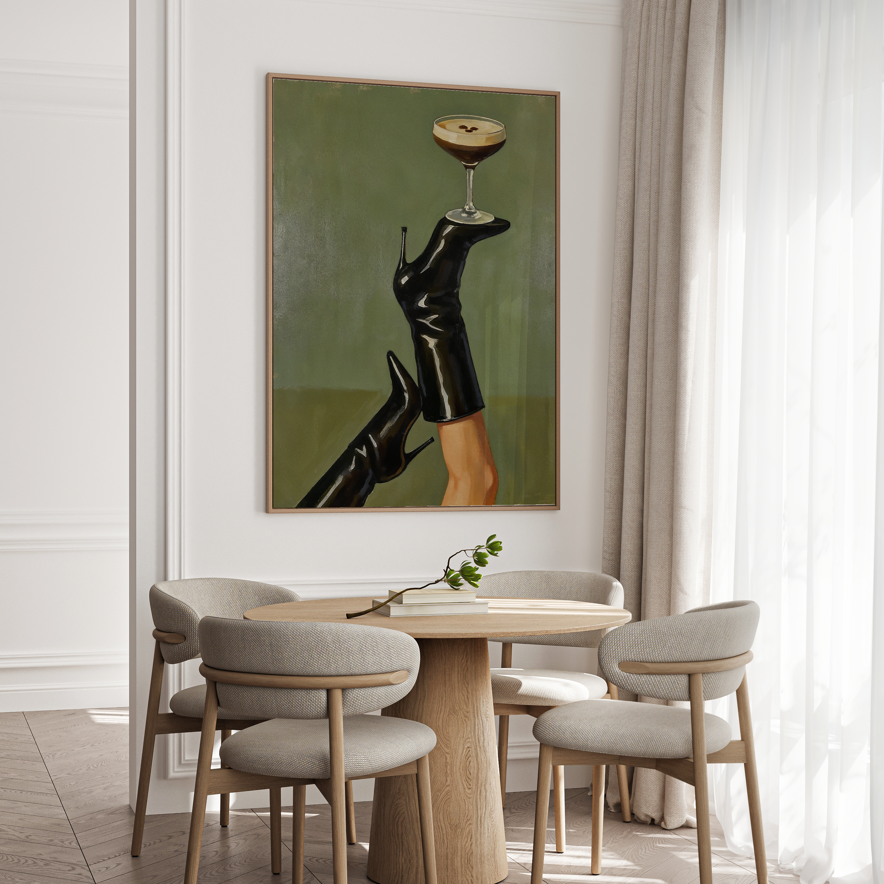 Dining room with a table and chairs, and a framed artwork on the wall.