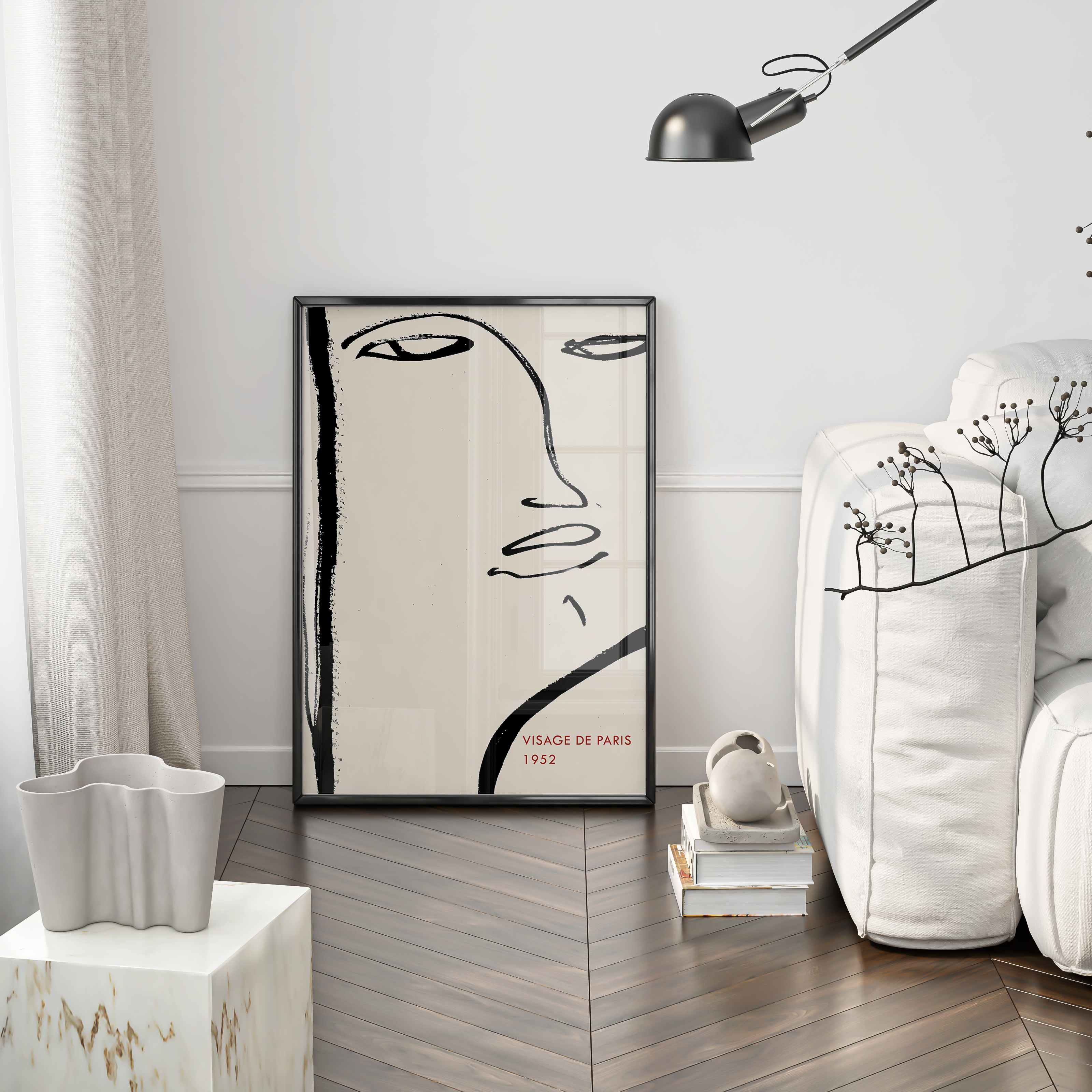 Modern interior with abstract art of a face on a wall, white furniture, and decorative elements.