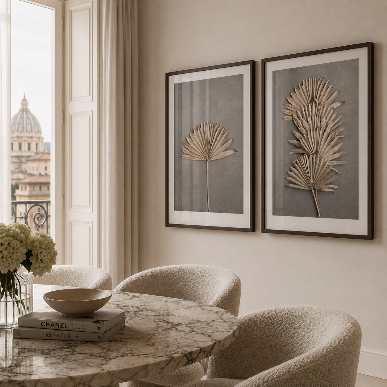 Elegant interior with marble table, chairs, and framed palm leaf art on the wall.