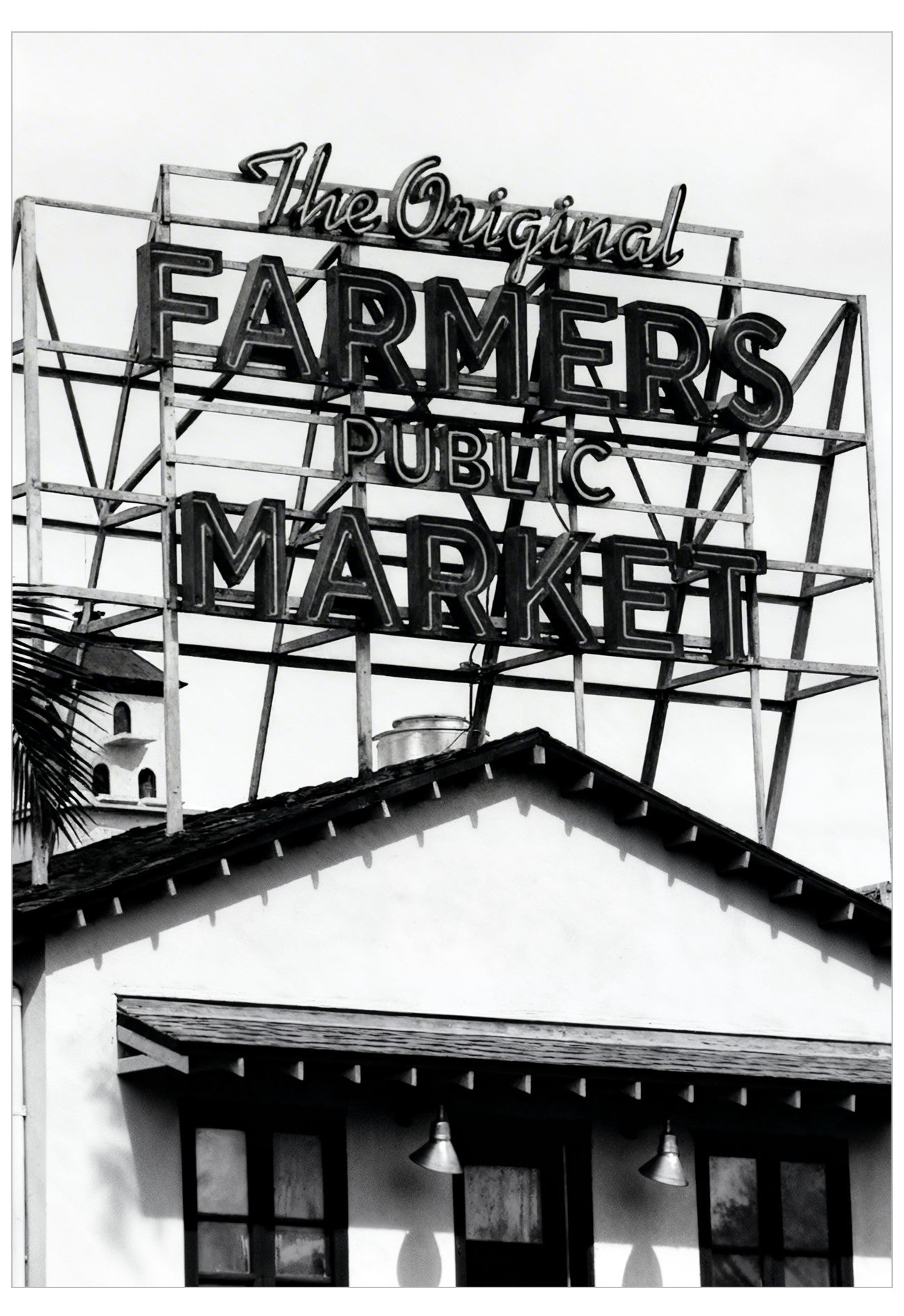Black and white image of a sign for 'The Original Farmers Public Market'.