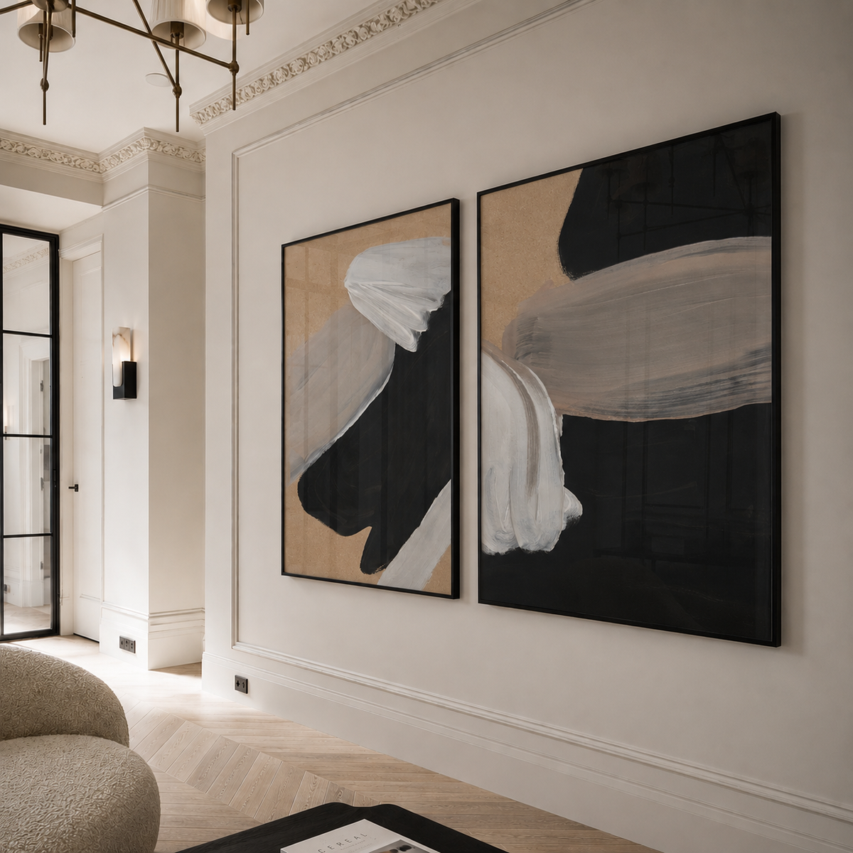 Two abstract paintings on a wall in a modern living room.