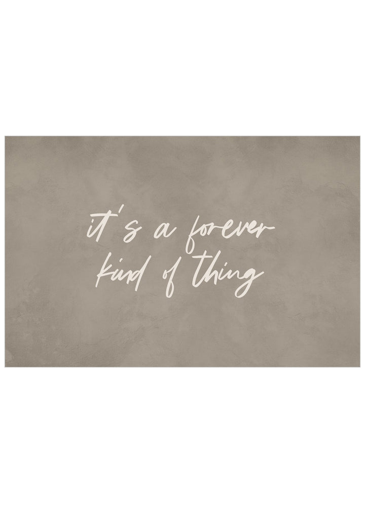 A rectangular wall art print with a textured taupe-brown background and white script text reading “it’s a forever kind of thing,” centered on a white background.