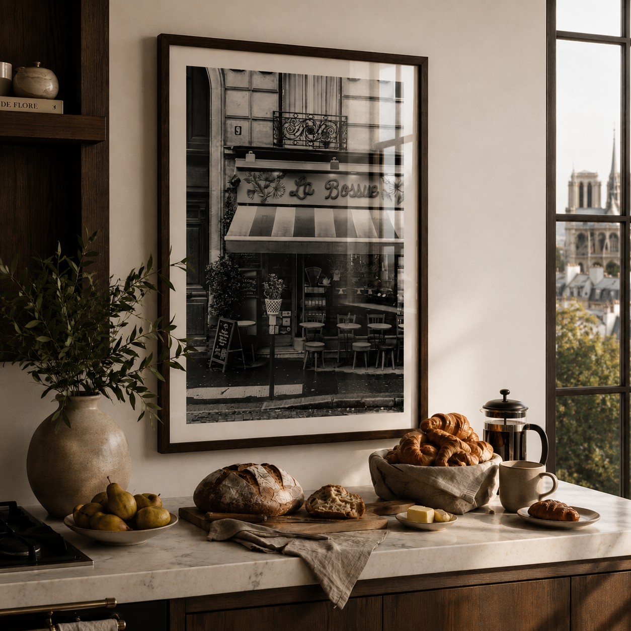 Black and white framed poster of a french patisserie in a luxury kitchen