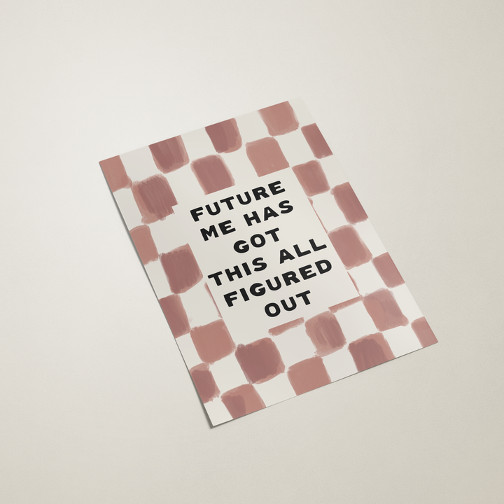 Notebook with striped design and text on a plain background