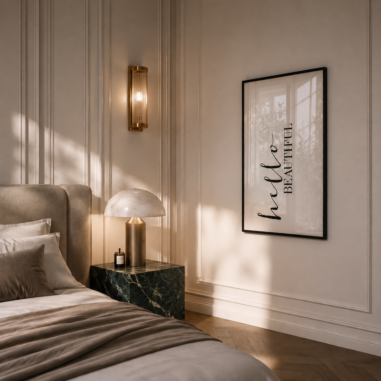 Modern bedroom with a bed, nightstand, wall sconce, and framed artwork.