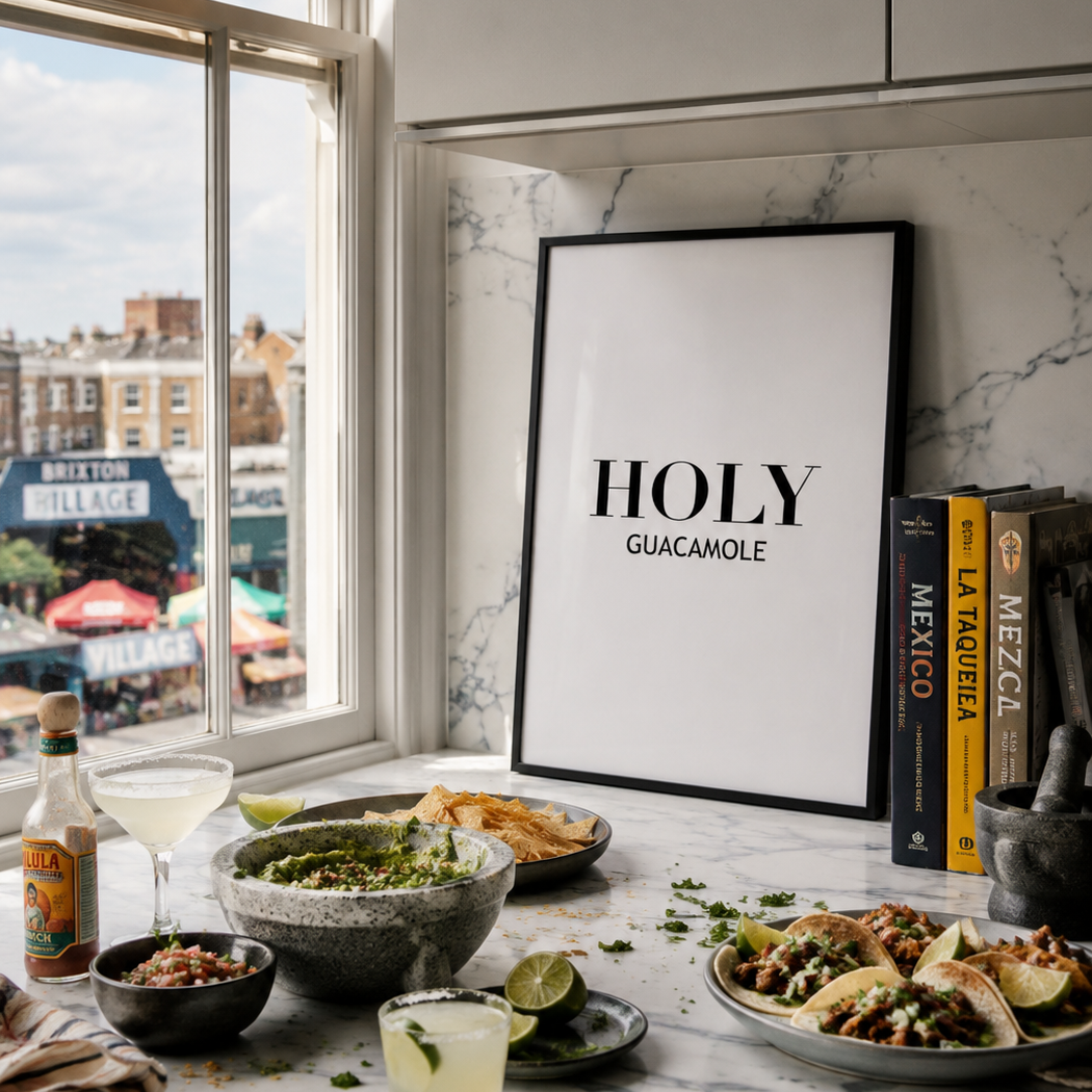 Kitchen counter with food, drinks, and a 'HOLY GUACAMOLE' sign.