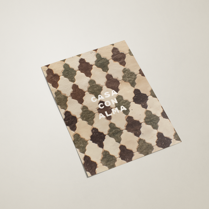 Notebook with a patterned cover and 'Casa con Alma' text on a beige background