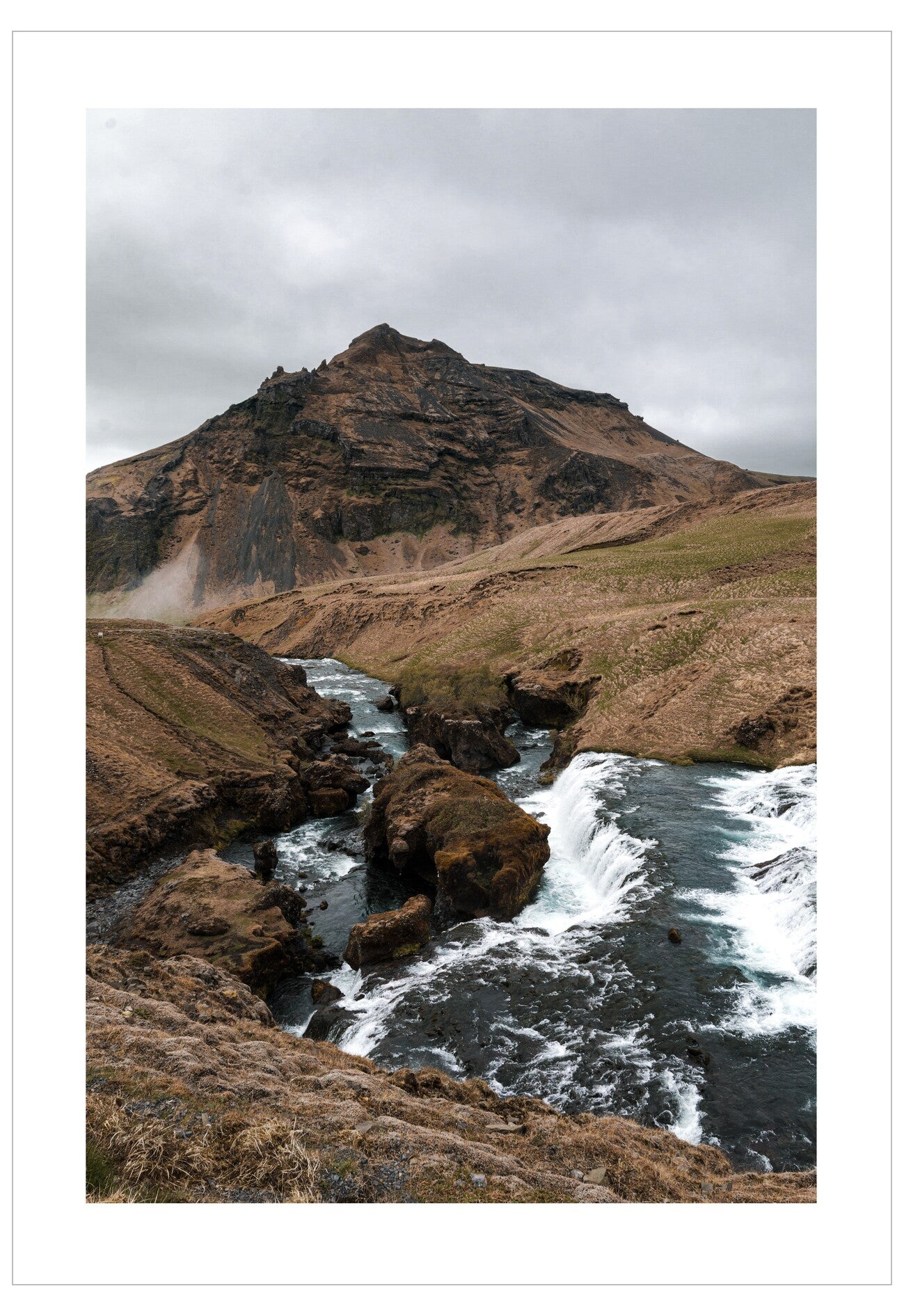 Mountain landscape with a river flowing through a valley