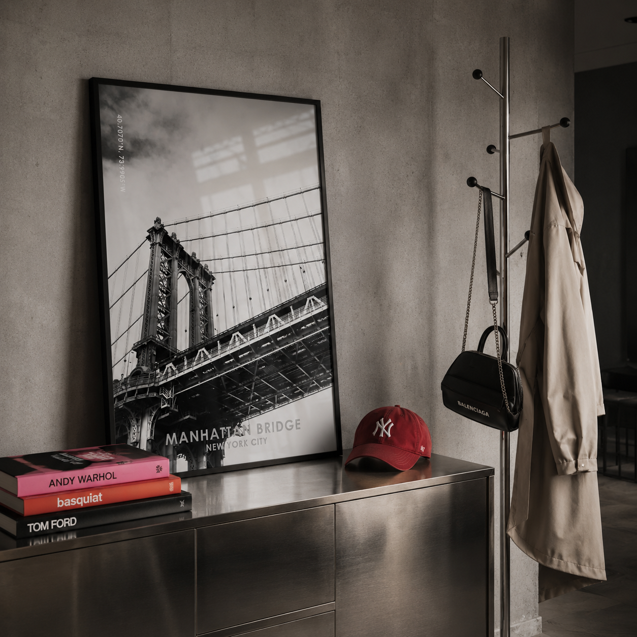 Stylish new york art work in black wooden frame on a stainless steel sideboard in a modern apartment