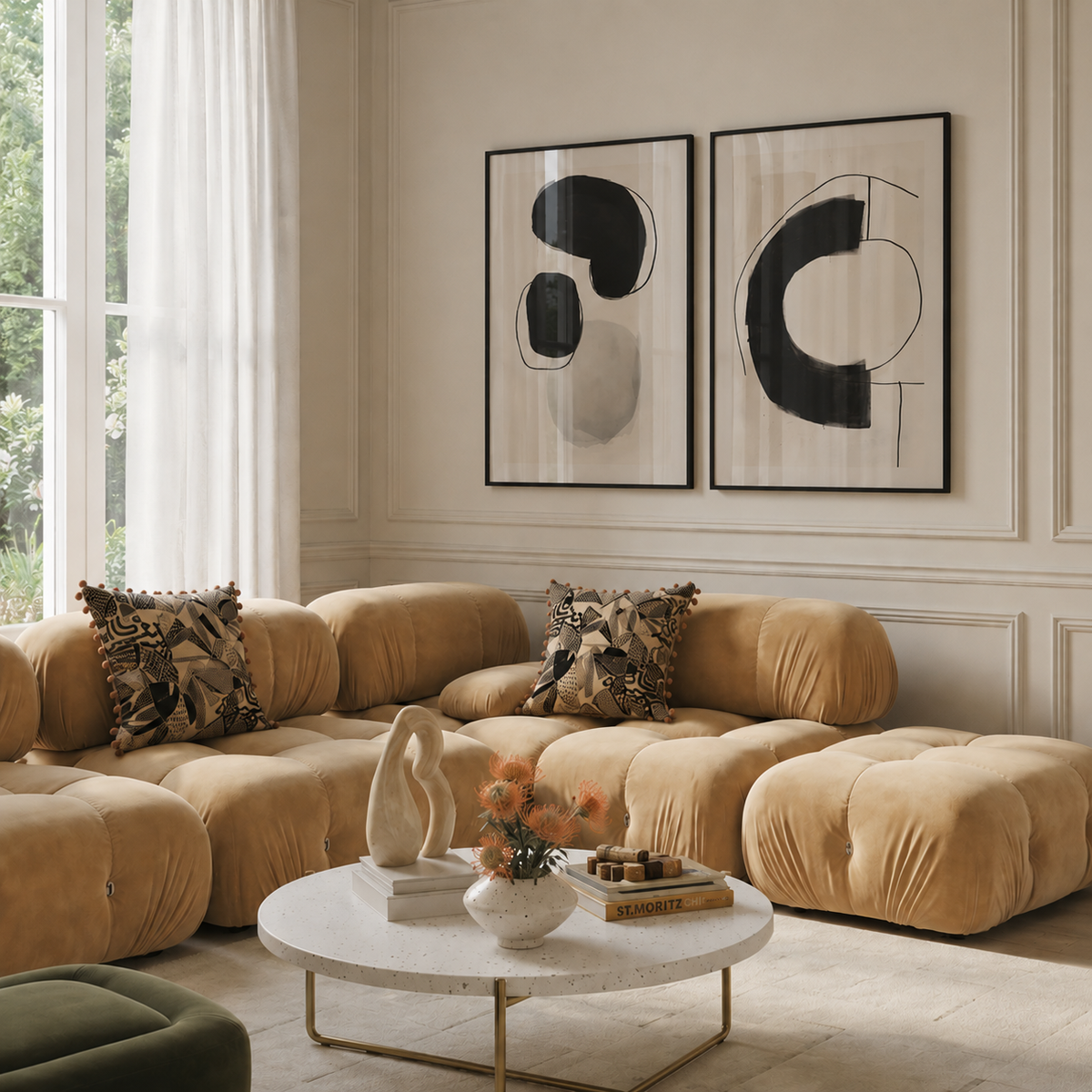 Modern living room with beige sectional sofa, abstract art, and a coffee table.